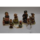 Seven Goebel/Hummel figures.