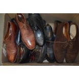 Assorted leather and suede gentleman's shoes.