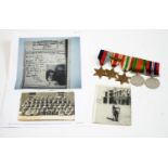 Five WWII medals; and two WWII period photographs.