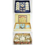 Three doll's tea sets