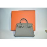Birkin Bag by Hermes: a 30 Sage Clemence leather handbag, with Palladium hardware, the two handles