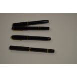 Four Conway Stewart fountain pens