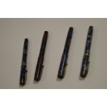 Four Conway Stewart fountain pens