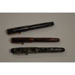 Three Parker fountain pens