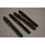 Four Conway Stewart fountain pens