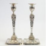 A pair of Adams style candlesticks