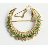 Emerald and diamond crescent brooch