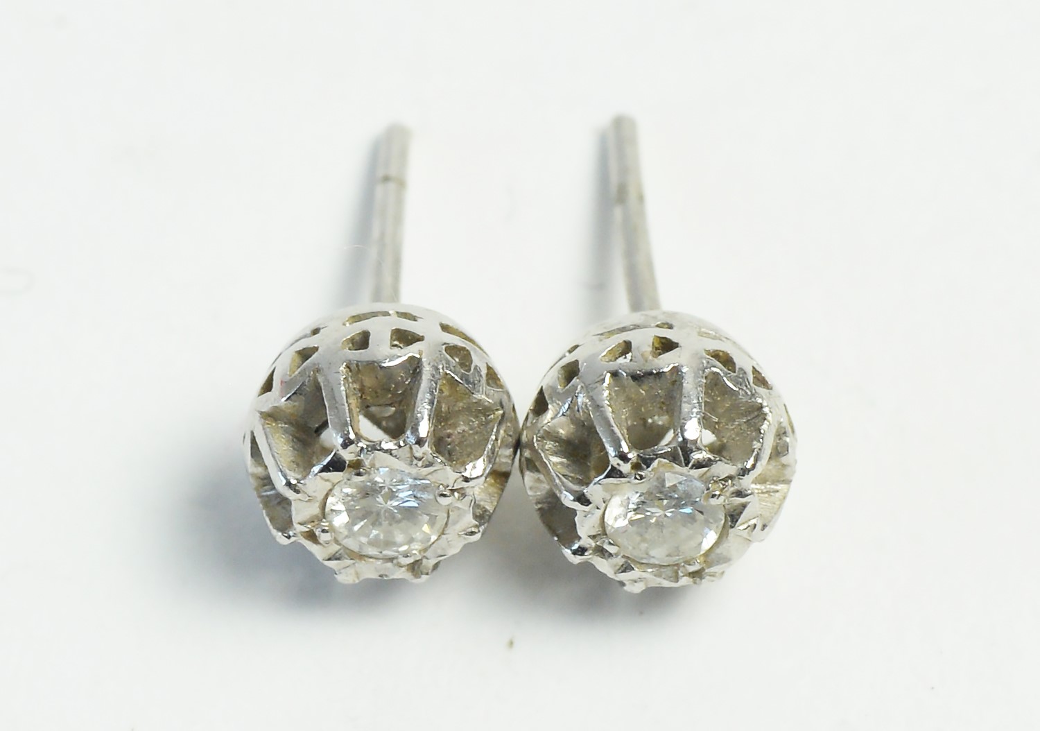 Pair diamond stud earrings