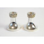 A pair of silver candlesticks and dish, for the Guild of Mercers