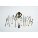 A suite of silver cutlery for twelve place settings