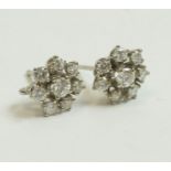 A pair of diamond cluster earrings