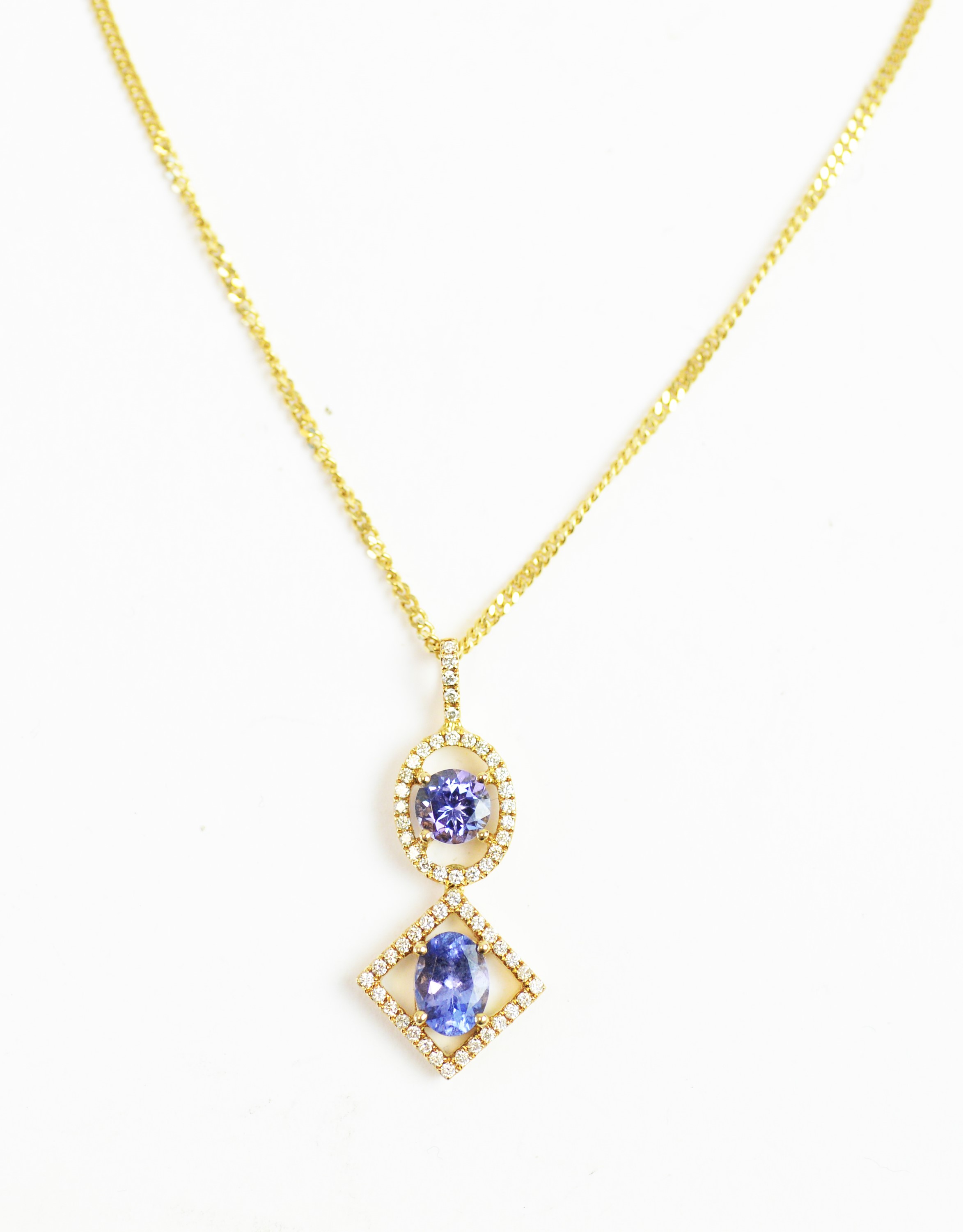 A tanzanite and diamond drop pendant - Image 2 of 4