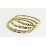 Three diamonds set bangles