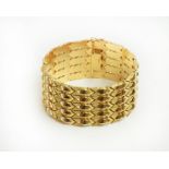 An 18ct yellow gold cuff bangle