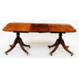 A late 19th Century mahogany twin pedestal dining table.