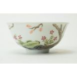 A Chinese famille rose bowl. Qianlong mark.