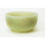 Small pale green jade bowl