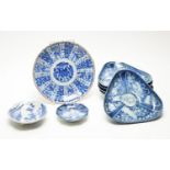 Eight Japanese blue and white dishes