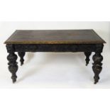 Victorian carved oak library table, in the Jacobean style