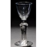 A round funnel wine glass.