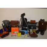 Four pairs of binoculars; and photographic sundries.