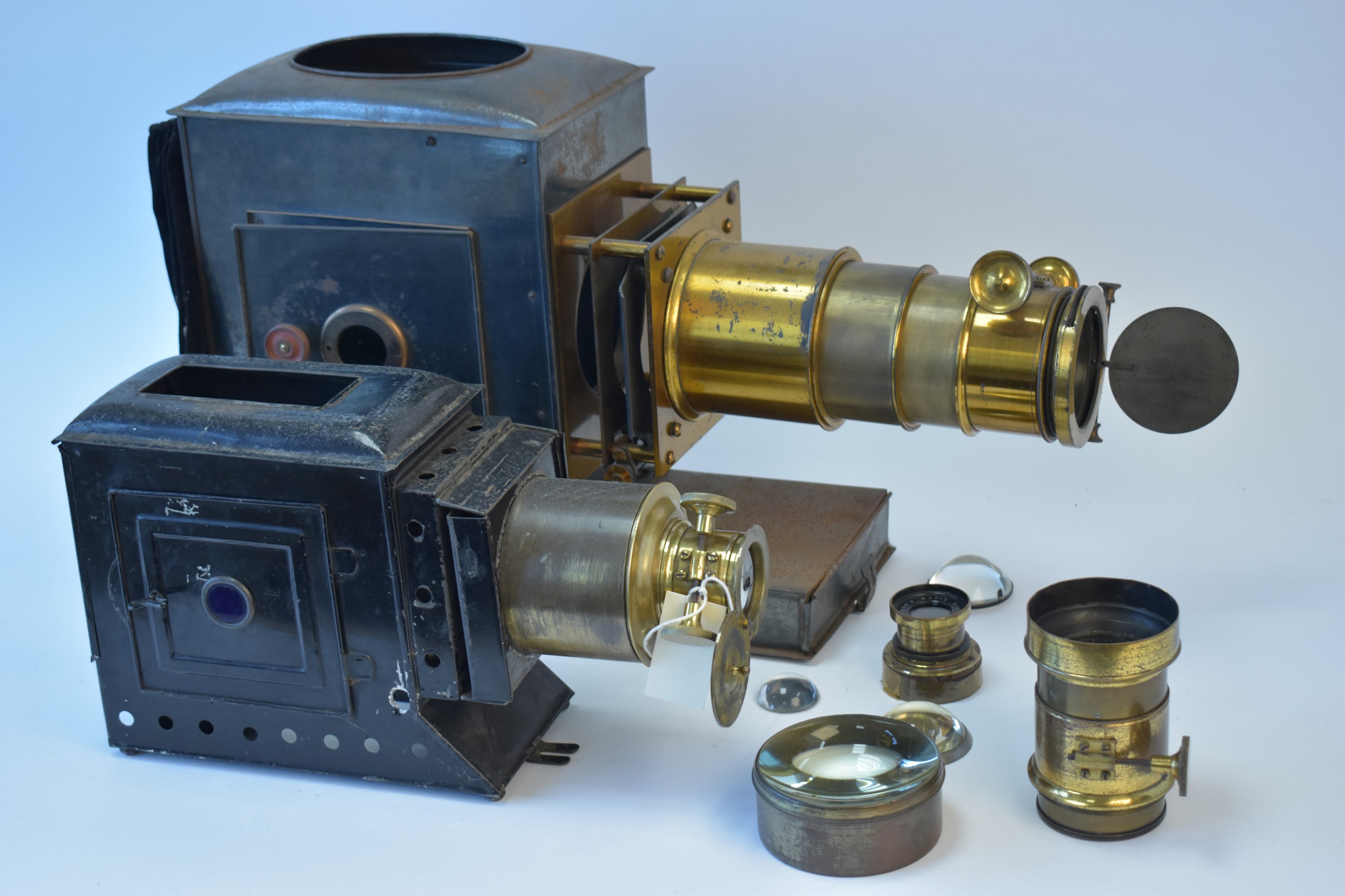 Two late 19th Century lantern-slide projectors.