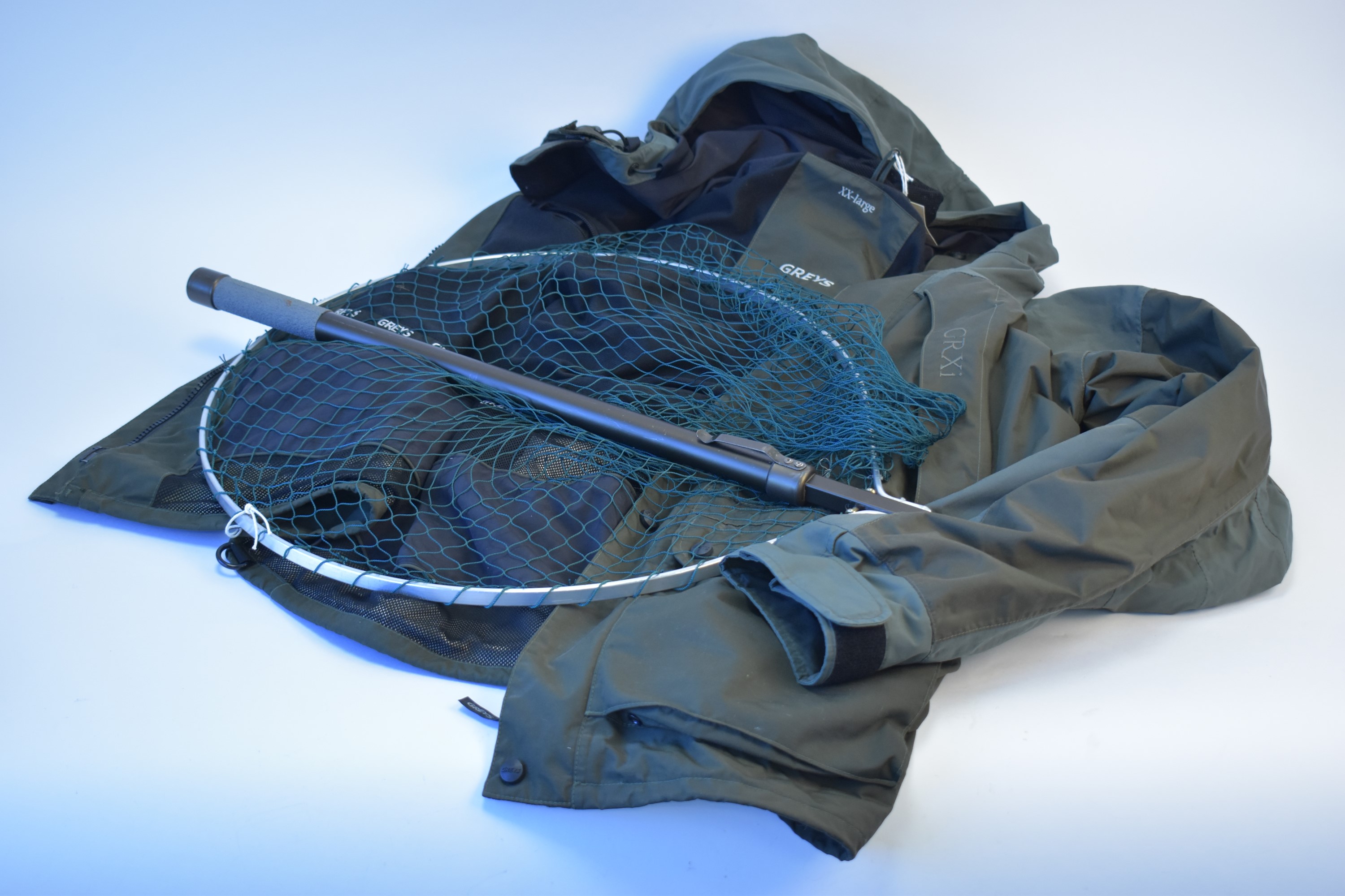 Greys of Alwnick fisherman's coat; and a folding landing net.