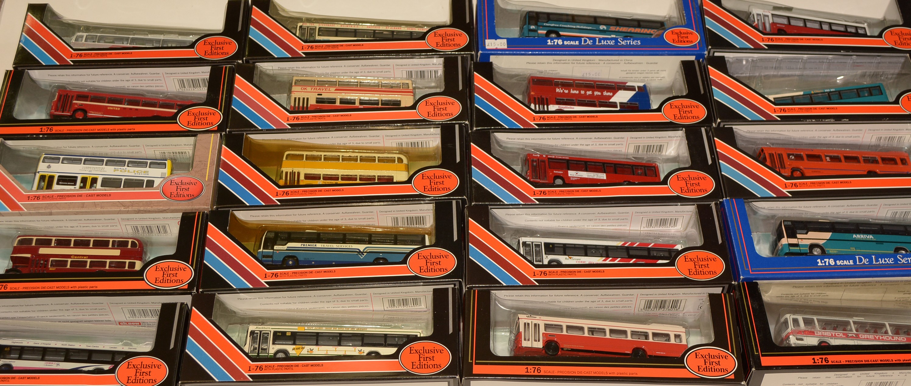 Twenty 1:76 scale Exclusive first editions (EFE) diecast model buses, boxed.