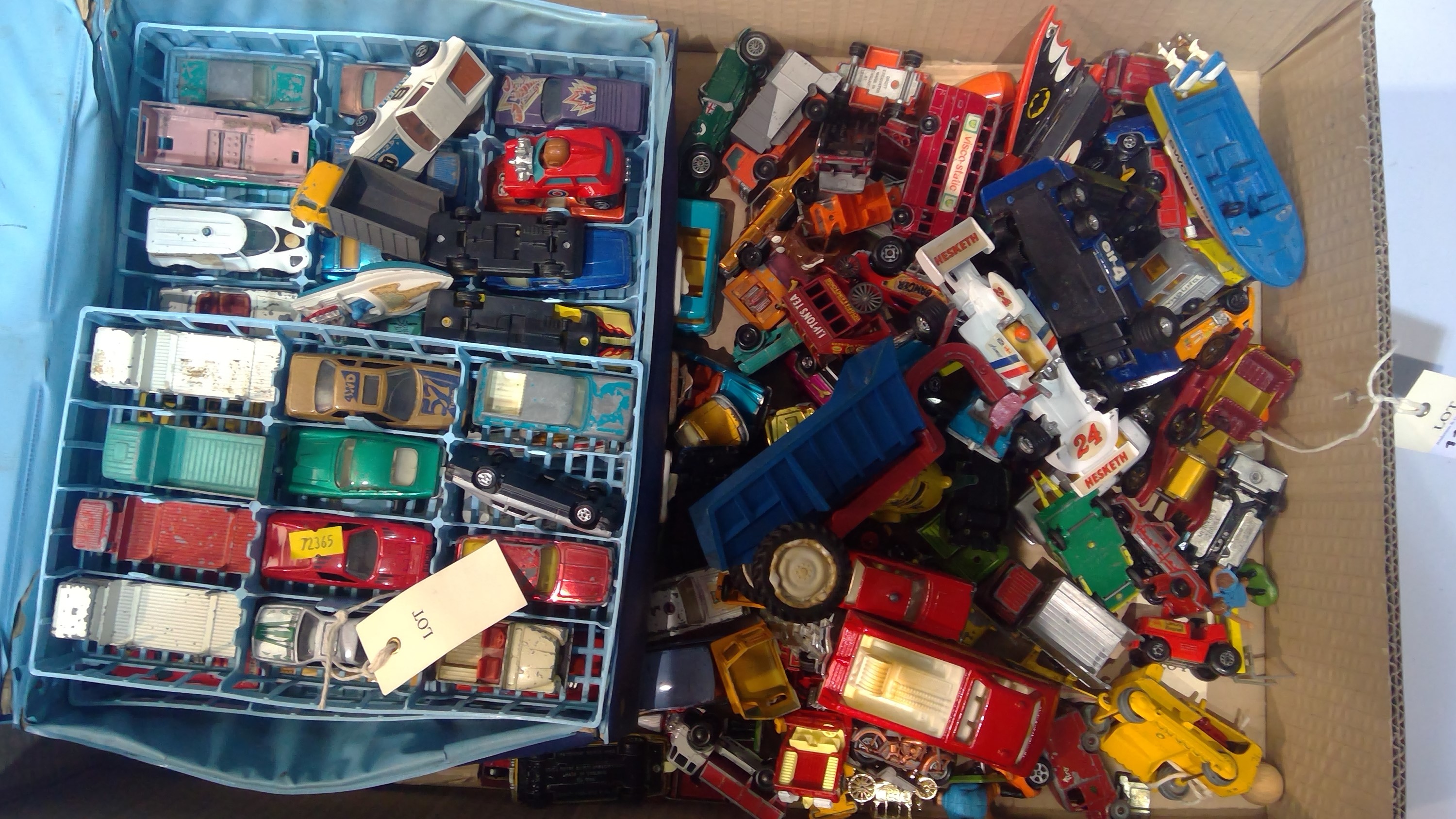 A box of miscellaneous diecast cars including Matchbox Series