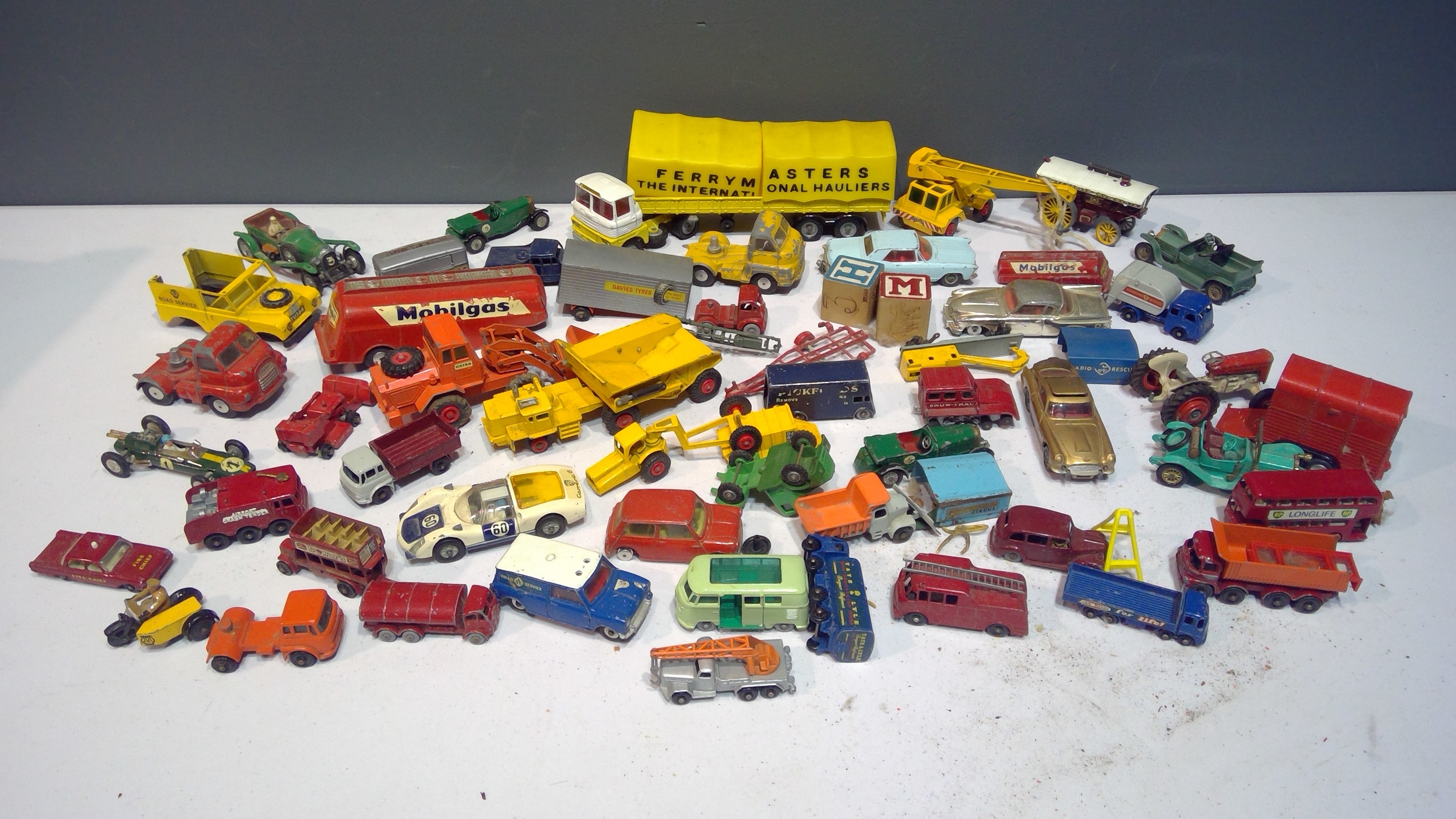 Playworn unboxed vehicles by Corgi, Lesney, Dinky and others