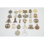 Collection of regimental cap badges