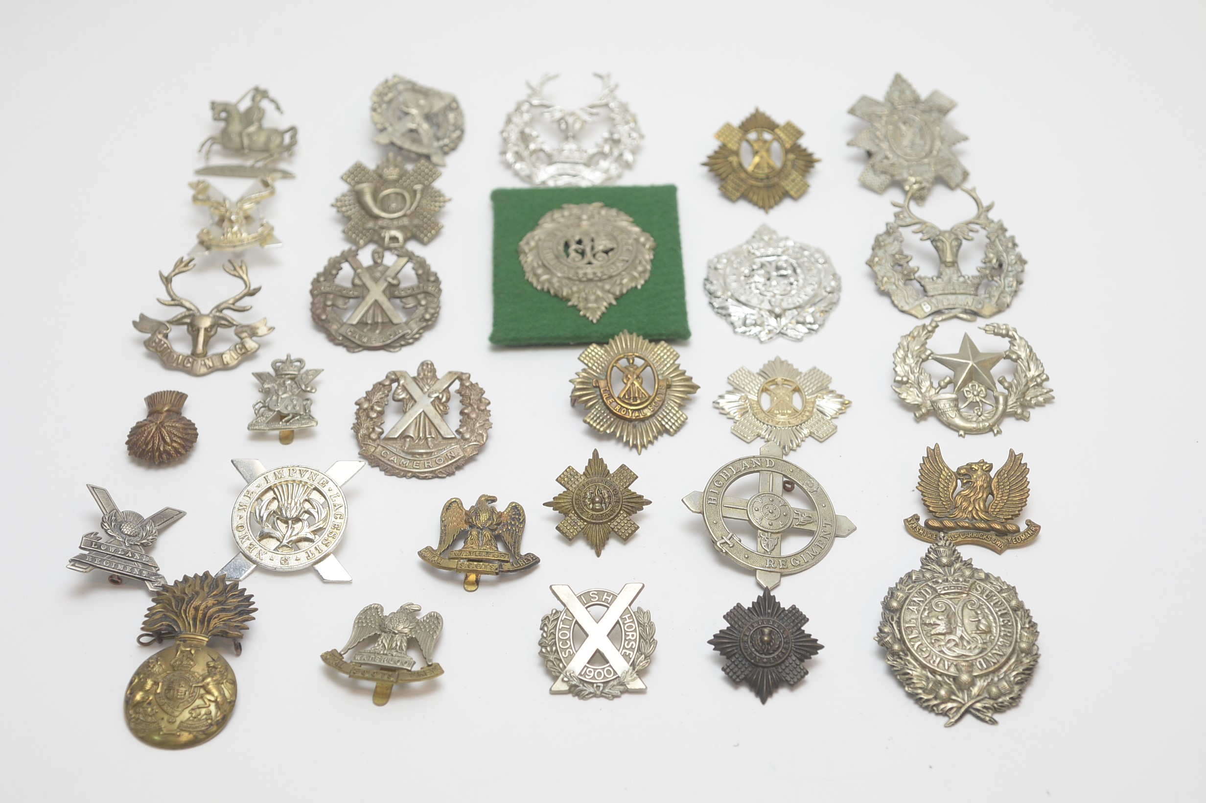 Collection of Scottish regimental cap badges