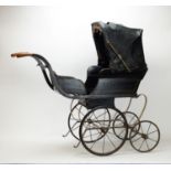 A late Victorian coach built dolls pram.