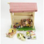 A mid-20th Century toy fruit, vegetable and flower stall