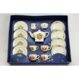 Cauldon Potteries Ltd., England: a Corona Coronation miniature tea set.