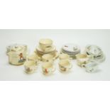 A child's miniature tea set, decorated with nursery rhyme transfers; part dinner set.