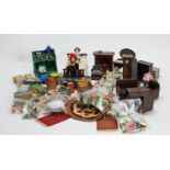 A collection of miniature dolls, furniture, shop fittings and other items.