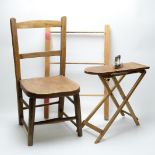 A child's pitch-pine nursery chair;, doll's ironing board, iron and clothes airer.