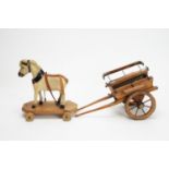 A late 19th Century pull-along toy pony and trap