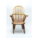 A child's elm and yew wood Windsor chair.