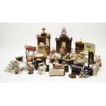 A collection of antique and vintage dolls, furniture and other items.