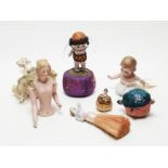 A 19th Century bisque pincushion doll, and five others, various.