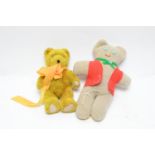 A c1930's/40's yellow plush teddy bear; and another.