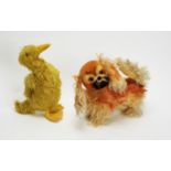 A toy Pekinese dog in mohair; and 20th C duck.