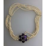 A five-row cultured pearl choker necklace