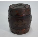 A Chinese hardwood and brass bound barrel form caddy