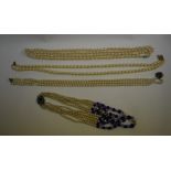 Four imitation pearl necklaces