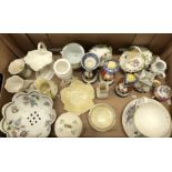 A box of decorative china, including Dresden, Belleek and three Toby jug Staffordshire cruets