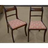 A pair of Regency style mahogany rope back side chairs