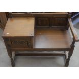 An Old Charm oak linenfold carved telephone seat